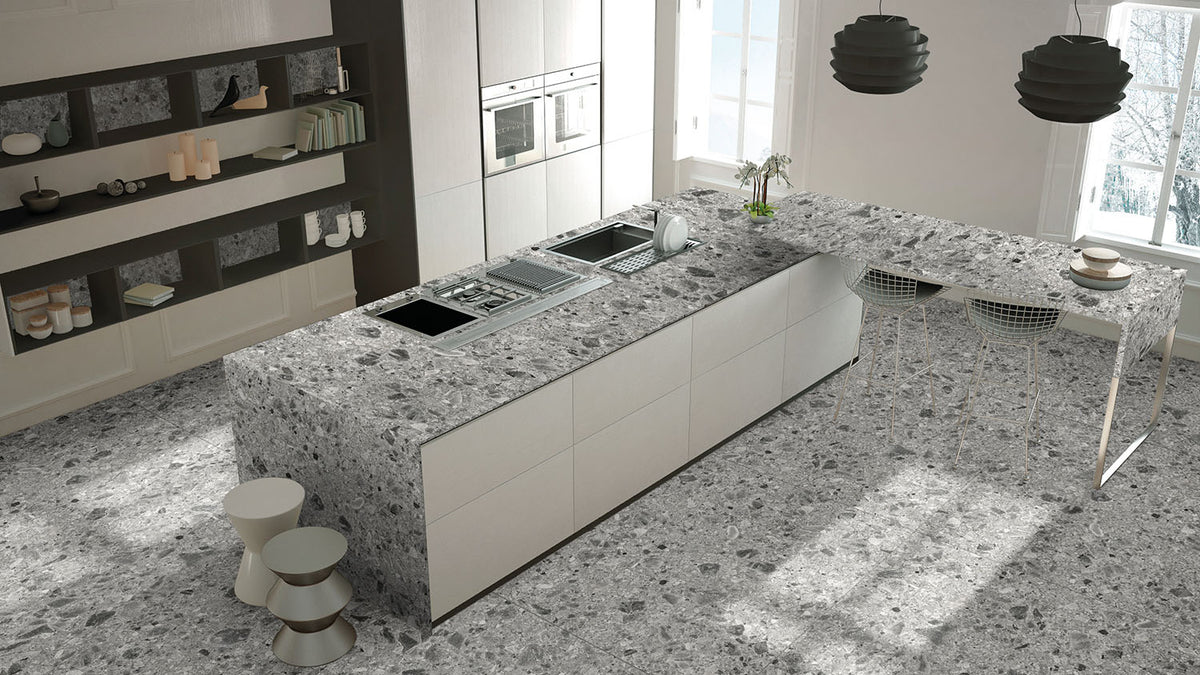 Relativa Ceppo di Gre porcelain slab installed in a room setting