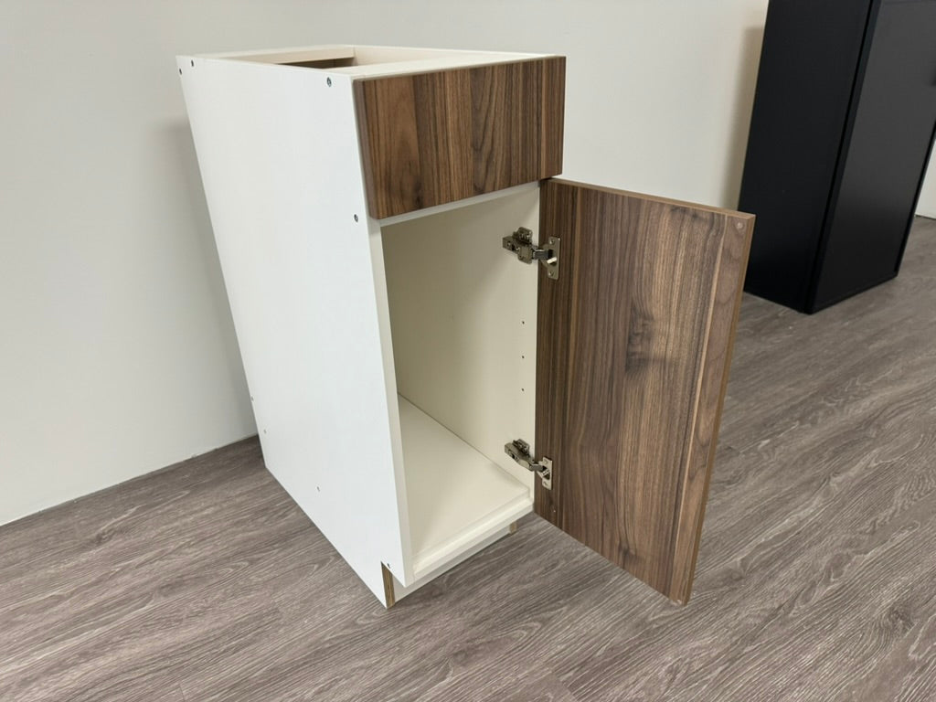 Coastal Euro Walnut base cabinet with door open, white melamine box and soft-close hinges