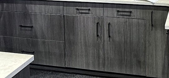 Ultimate Euro Smoked Oak base cabinets and drawer bases with black bar pulls